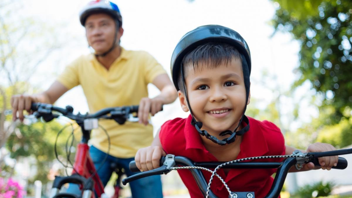 A family out for a bicycle ride