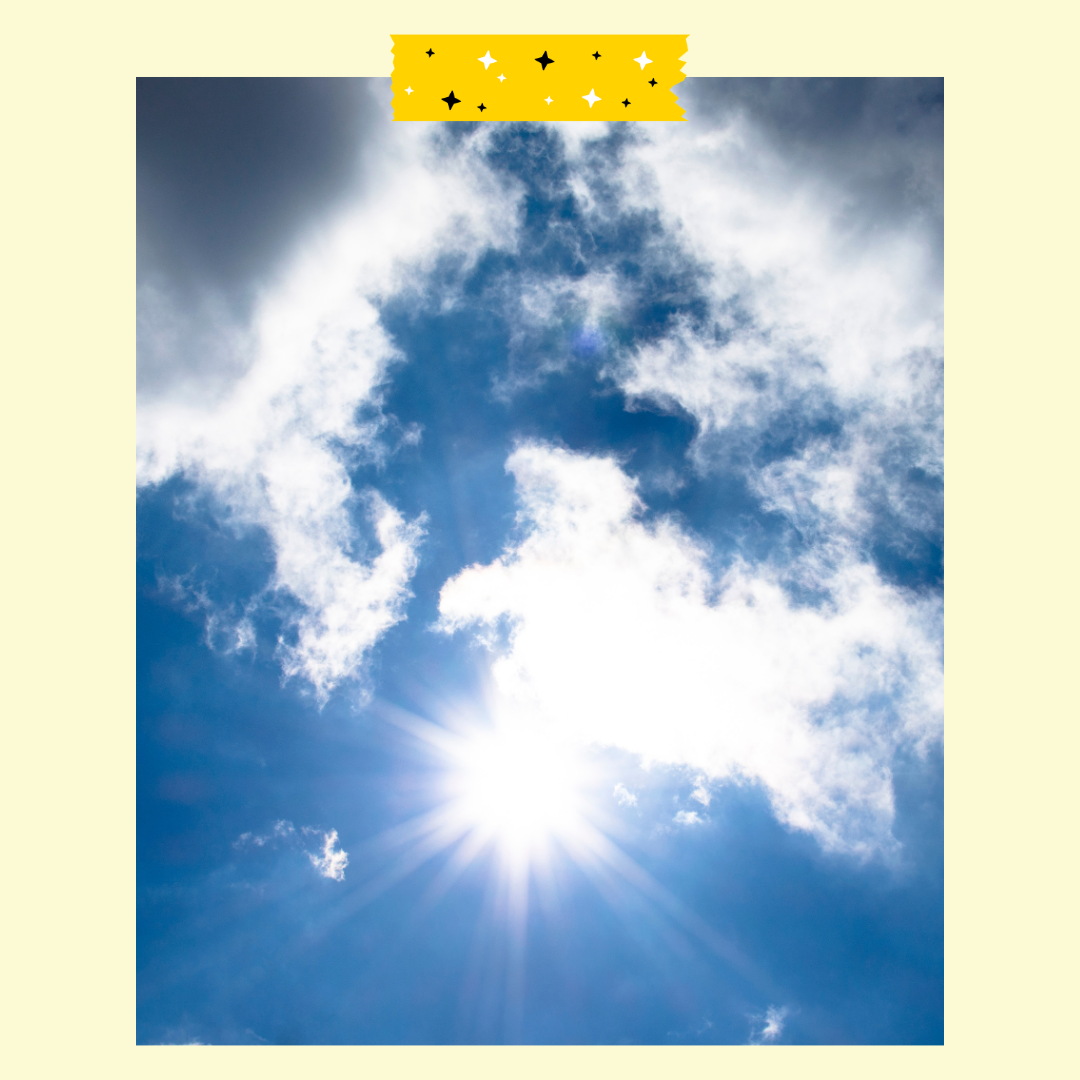 sky with sun peeking out from behind clouds 