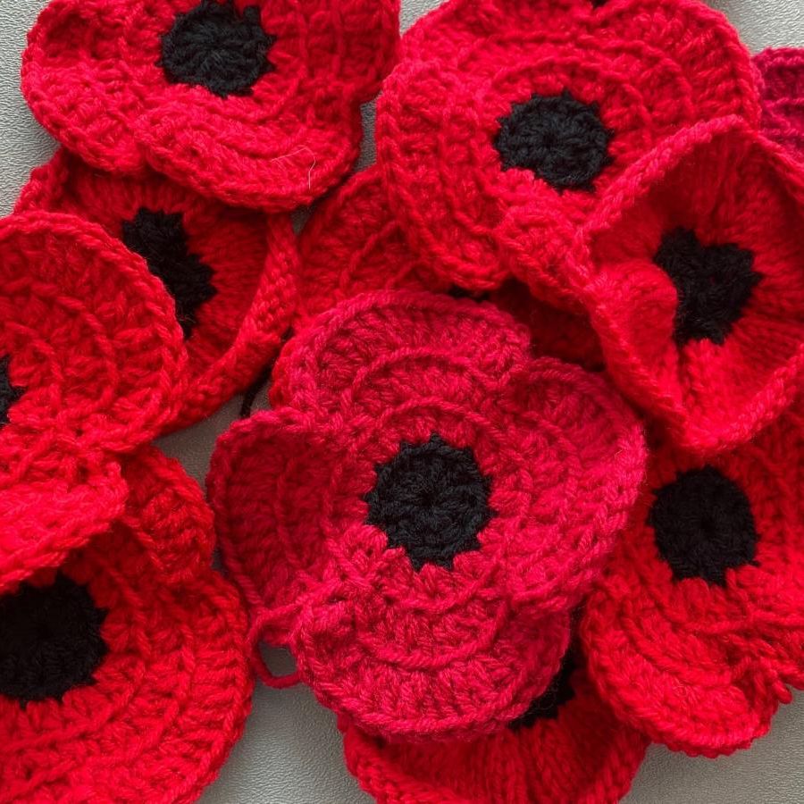 cluster of handmade crochet poppies