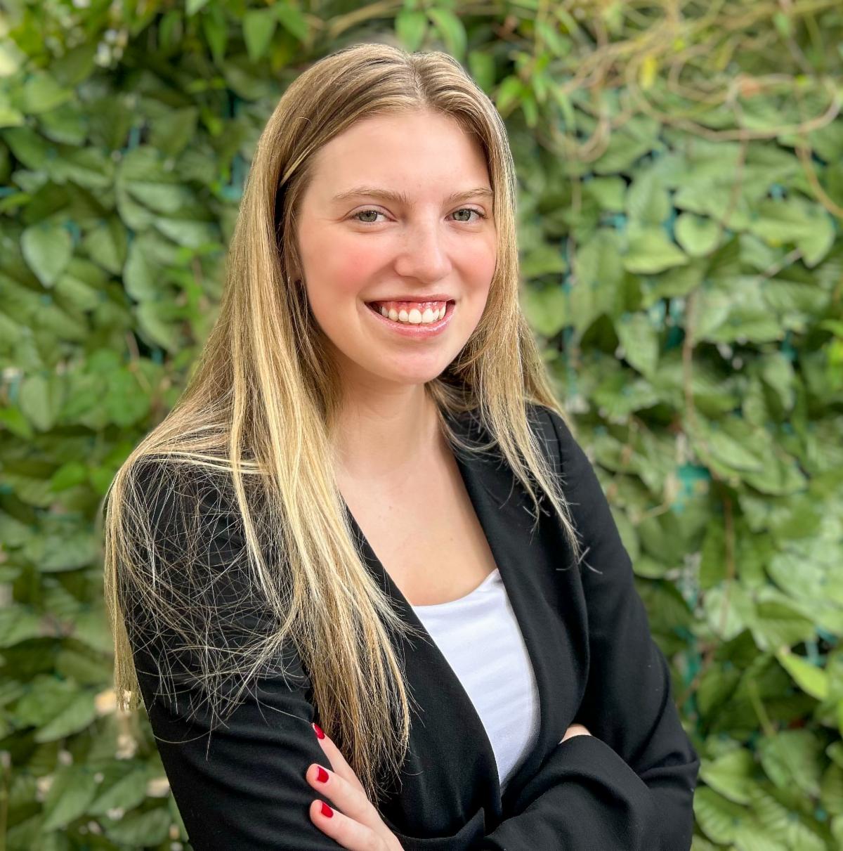 Headshot of Sydney Poniewaz