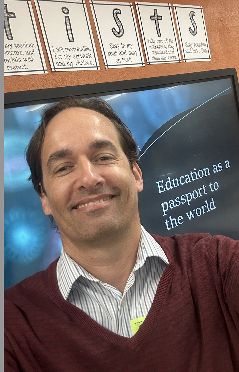 headshot of Dr. Andrew DeMil at the Great American Teach in 