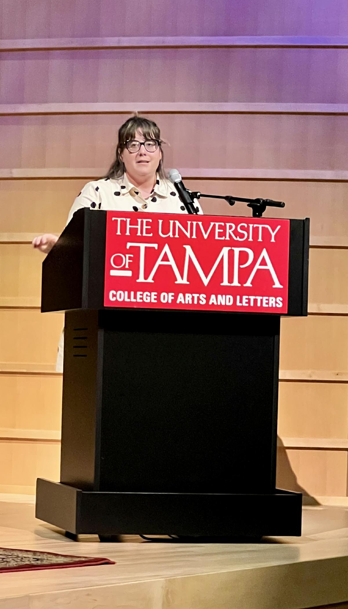 Lacey Corey Brown at the podium in Gordon Theater