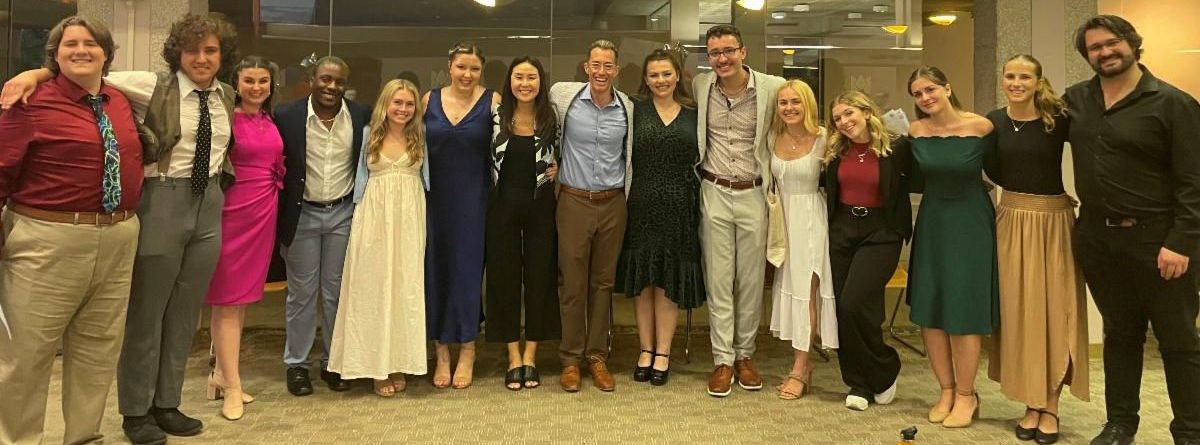 Picture of award-winner student vocalists with faculty 