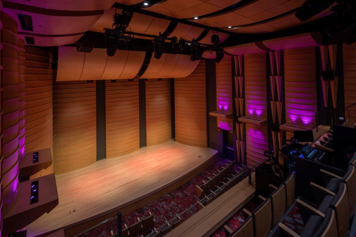 full shot of the Gordon Theater in purple and pink lights