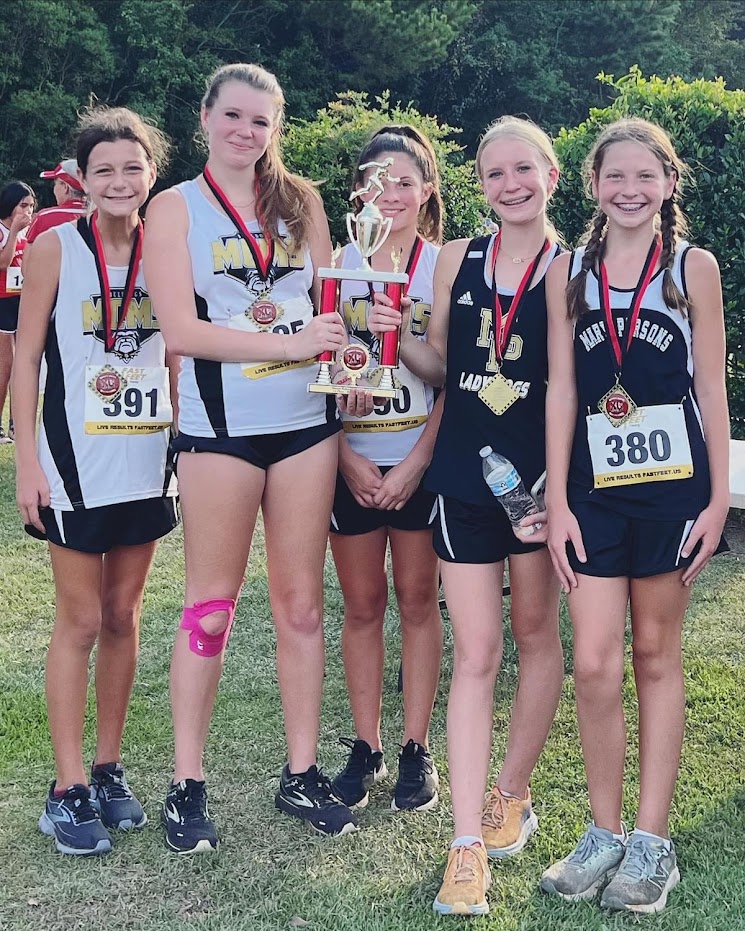 mcms xc girls with trophy
