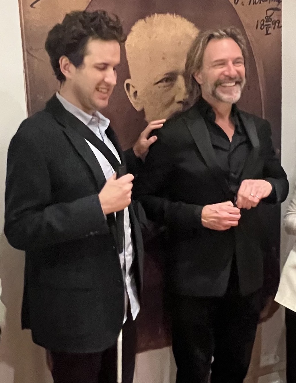 Daniel Gillen and Eric Whitacre standing side by side and smiling.