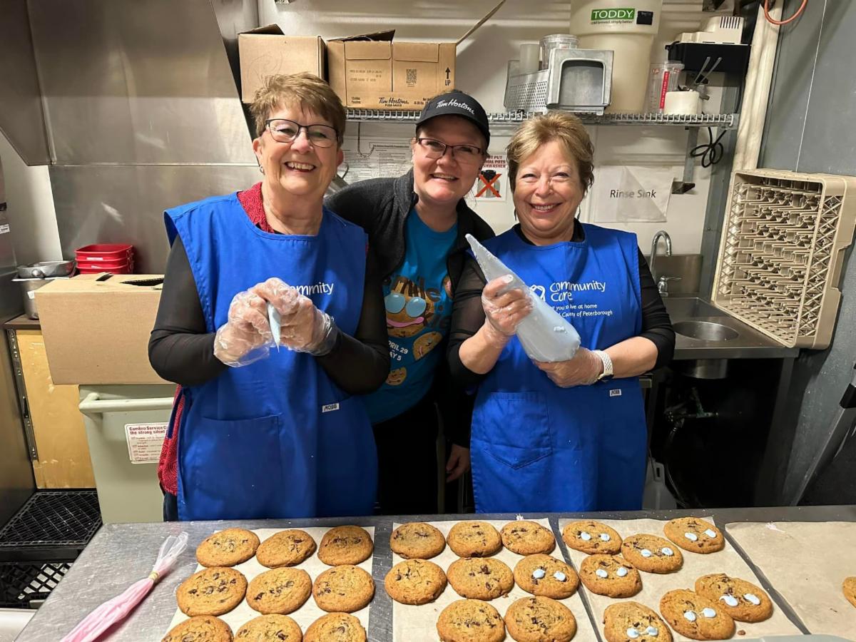 Volunteers decorate Smile Cookies in Bridgenorth Tim Hortons