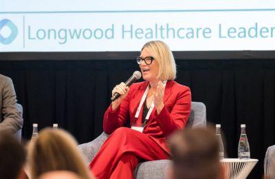 BostonCEO2025_1_speaker-red-suit