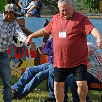 A photo of Jasper Culture and Historical Centre volunteer Donny White taking part in a round dance.