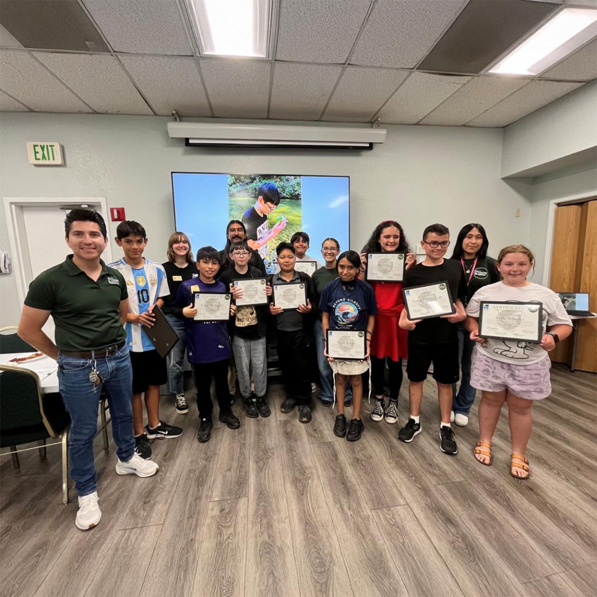 Beyond Gilroy participants holding up their graduation certificates