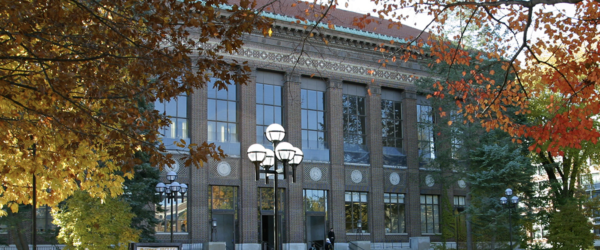 Exterior of the Hatcher Library in autumn.