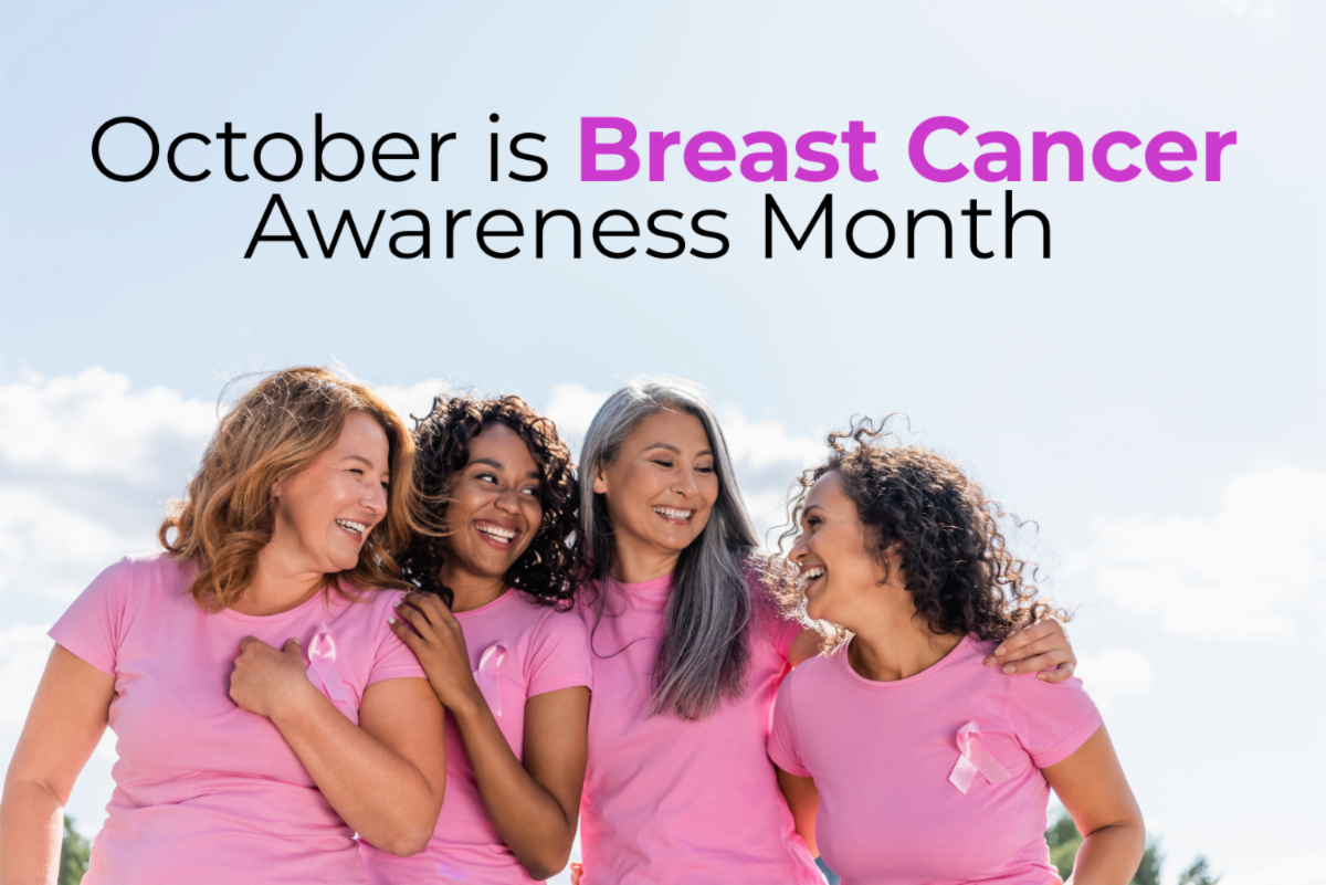4 women wearing pink for breast cancer awareness month