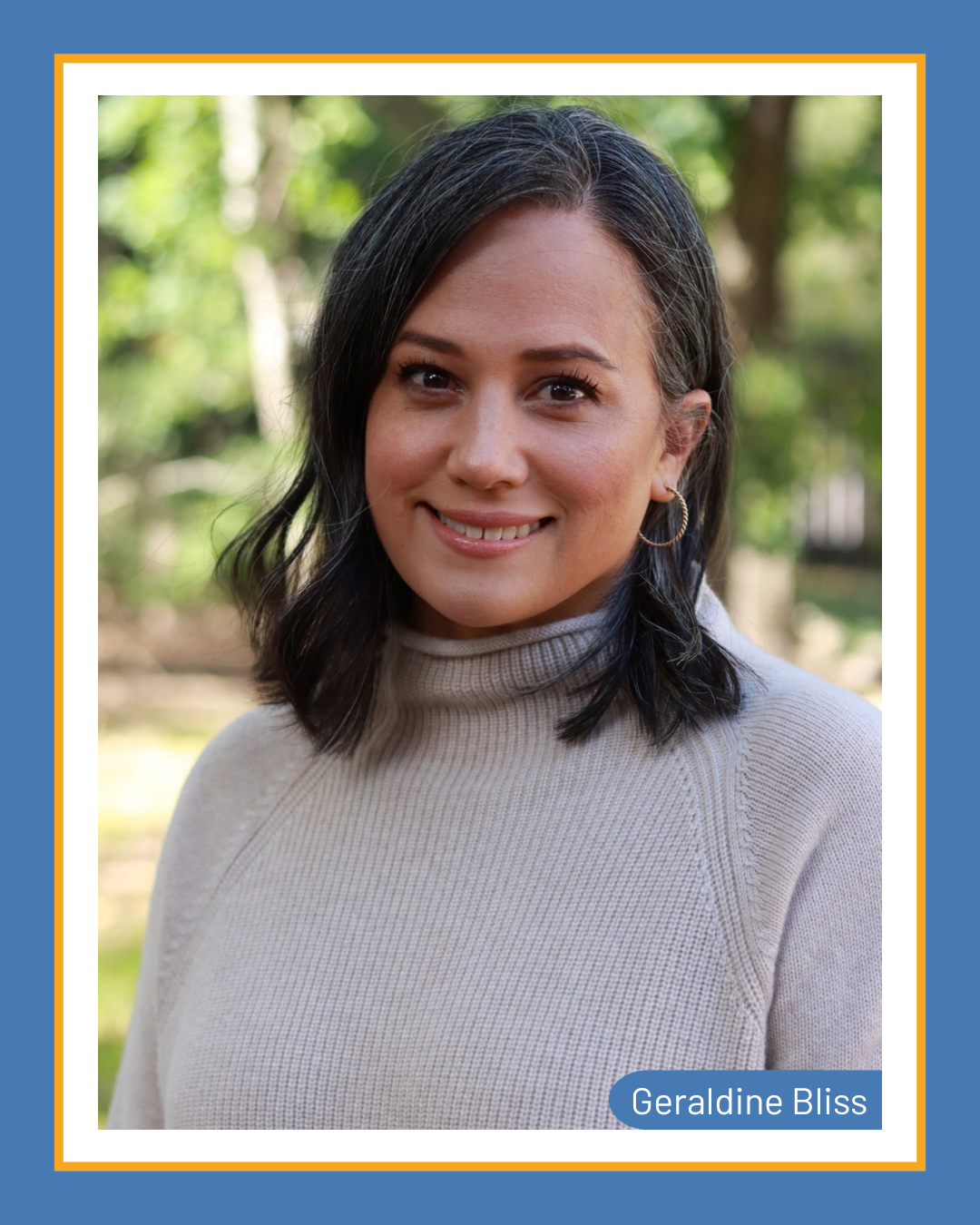CureSHANK President Geraldine Bliss, a woman in a grey turtleneck, smiling in front of a tree-lined background.