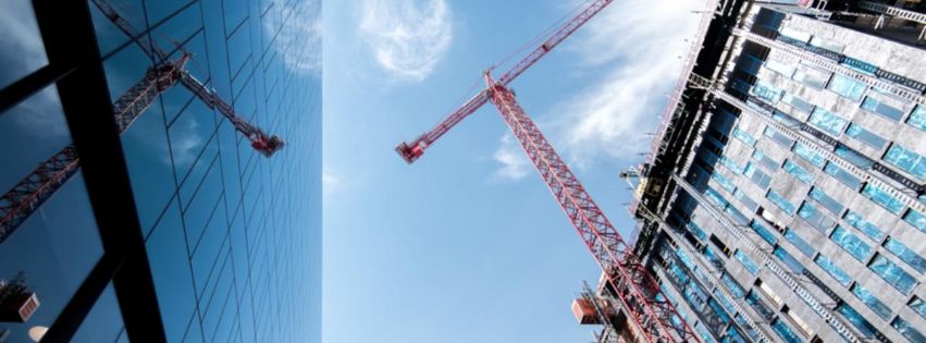 crane and buildings with blue sky