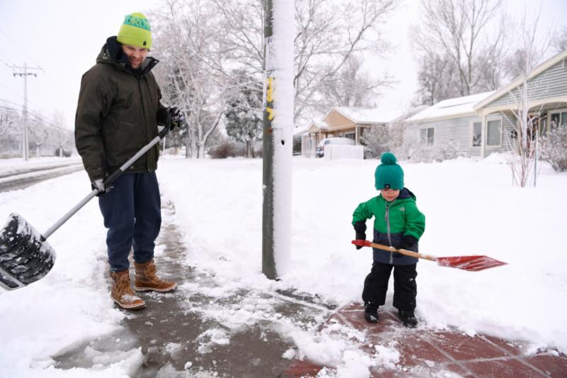 Denver Post photo shoveling snow