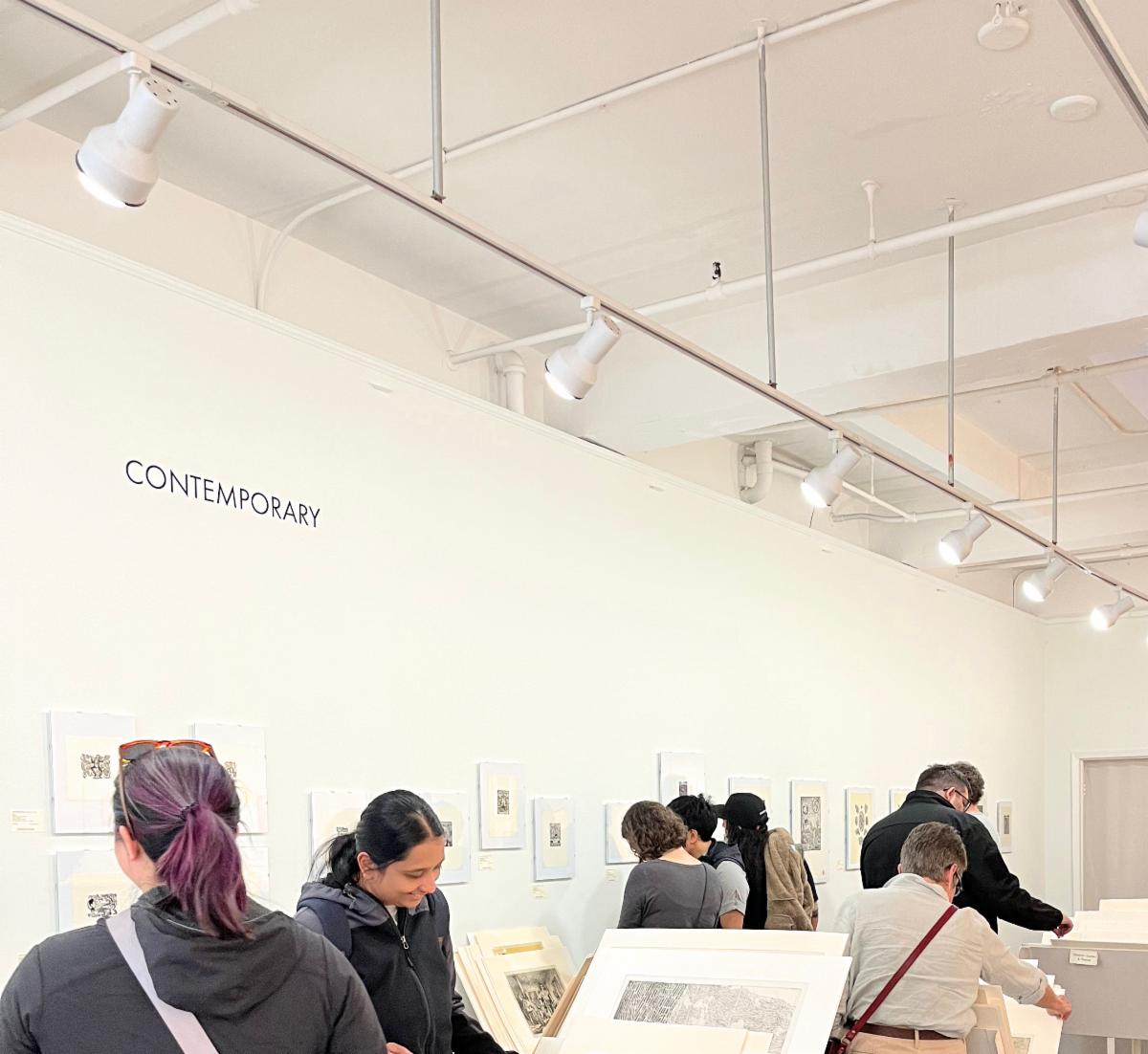 People at Davidson galleries looking at art