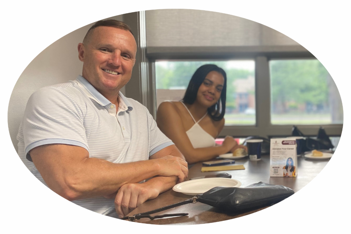 President Ken Daly with a student in the Romano Student Alumni Center