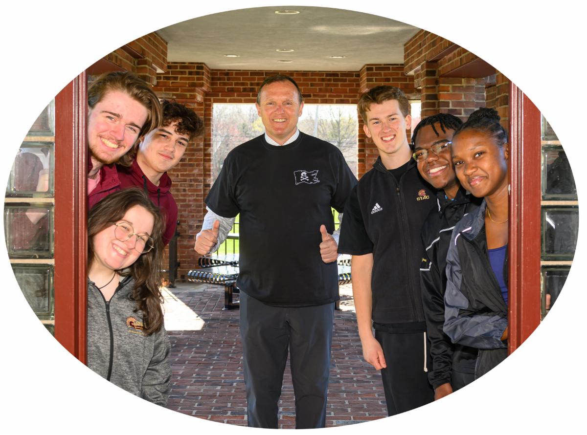 President Daly and students