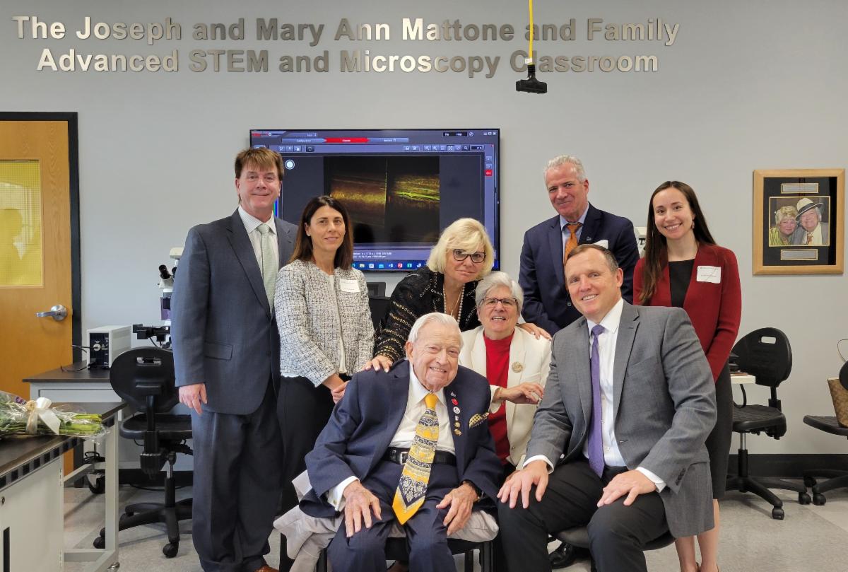 Mattone Classroom and family smiling during opening of space