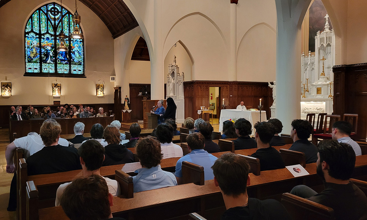 Memorial Mass at Sacred HEart Chapel with Romaine McNelis giving eulogy