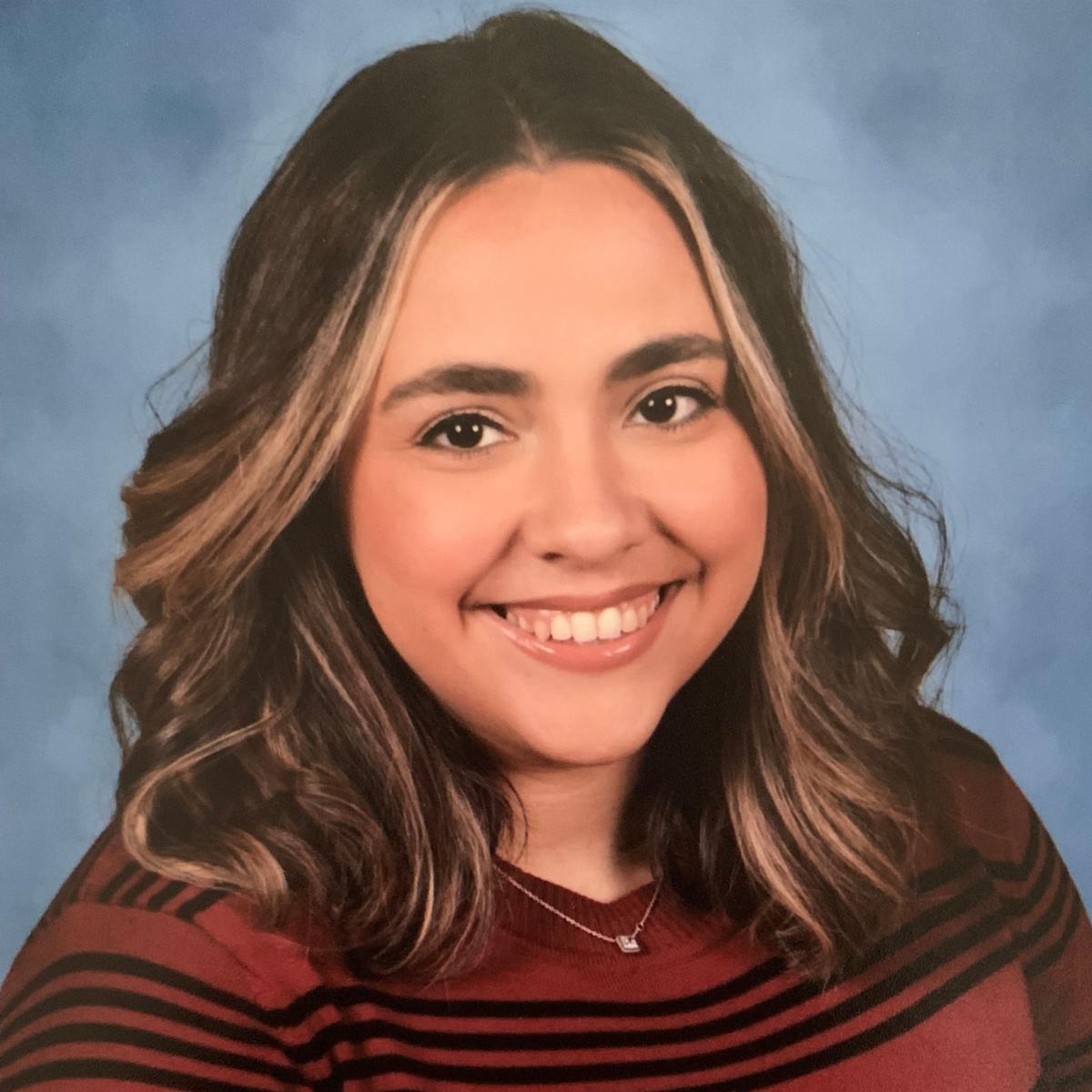 Lauren smiling for school photo