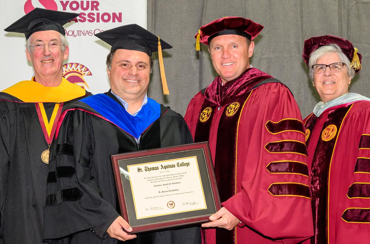 Rossen Dean Murphy President Emerita Fitzpatrick and President Daly smiling at Honors Convocation