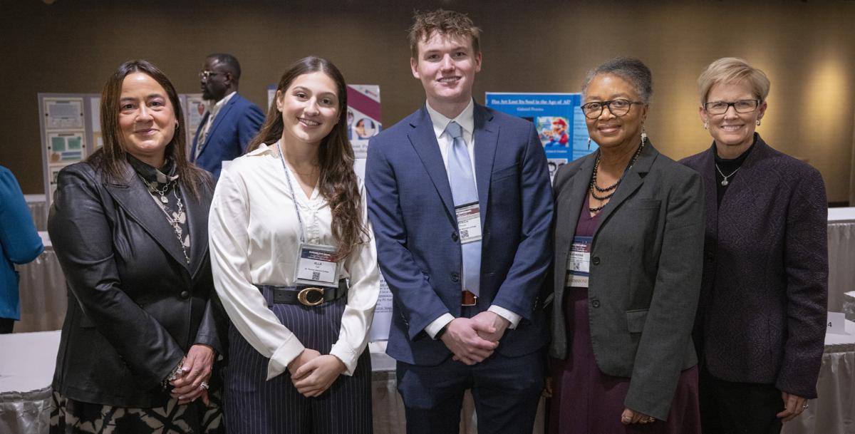 MSCHE poster session students and representatives smiling