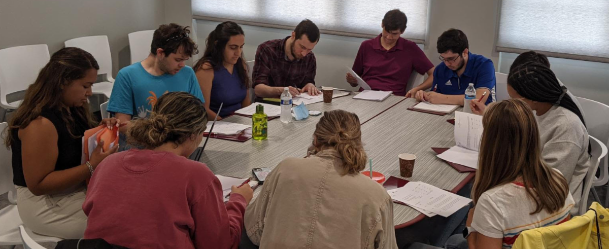 Group of students seated in admissions office at Skills Immersion program