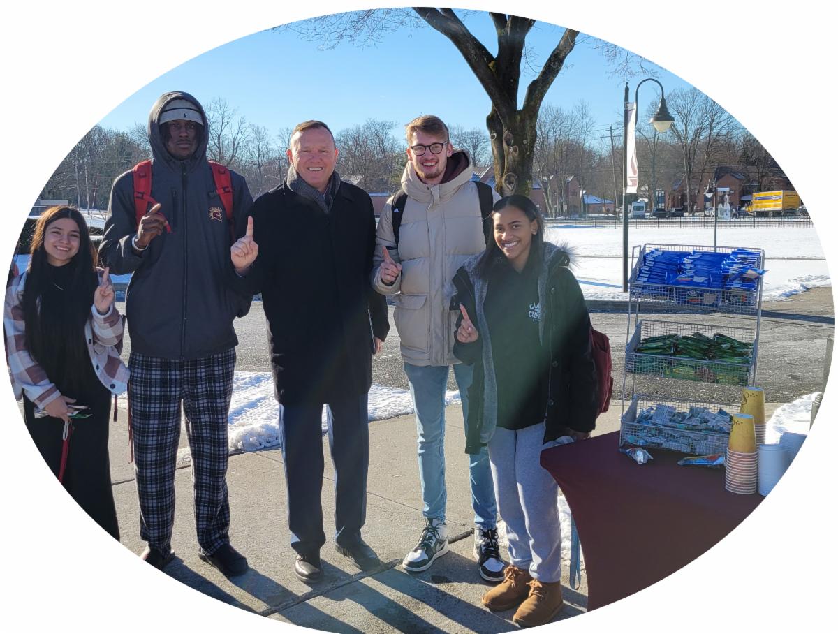 President Daly and Students Spring 2024 First Day of Classes