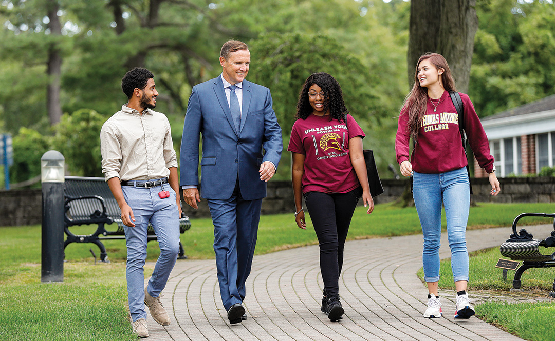 Ken walking with students