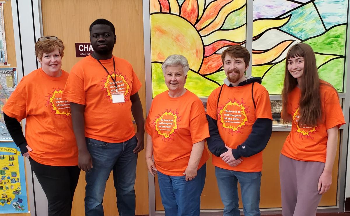 STAC participants in DPIC smiling for photo in Library