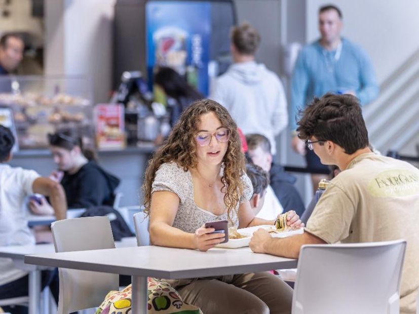 RSAC with students seated at tables talking