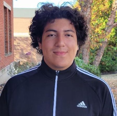 Holger smiling outside