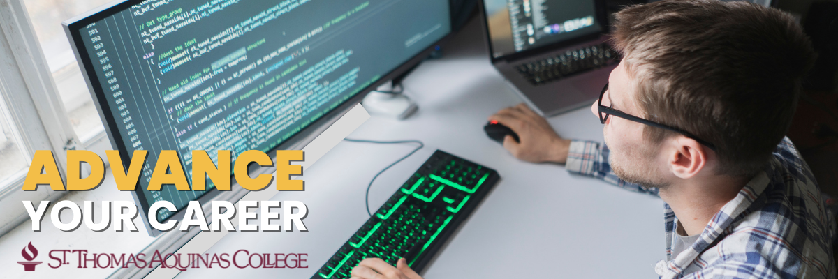 Advance Your Career with Image of Professional Working on Code on a Computers with Saint Thomas Aquinas College Logo