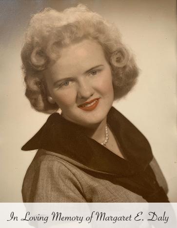 Margaret smiling with text at bottom in script in loving memory of Margaret E Daly