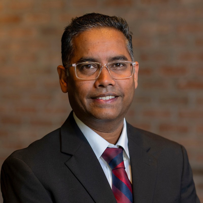Man in suit smiling portrait