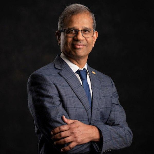 Man in suit dark background