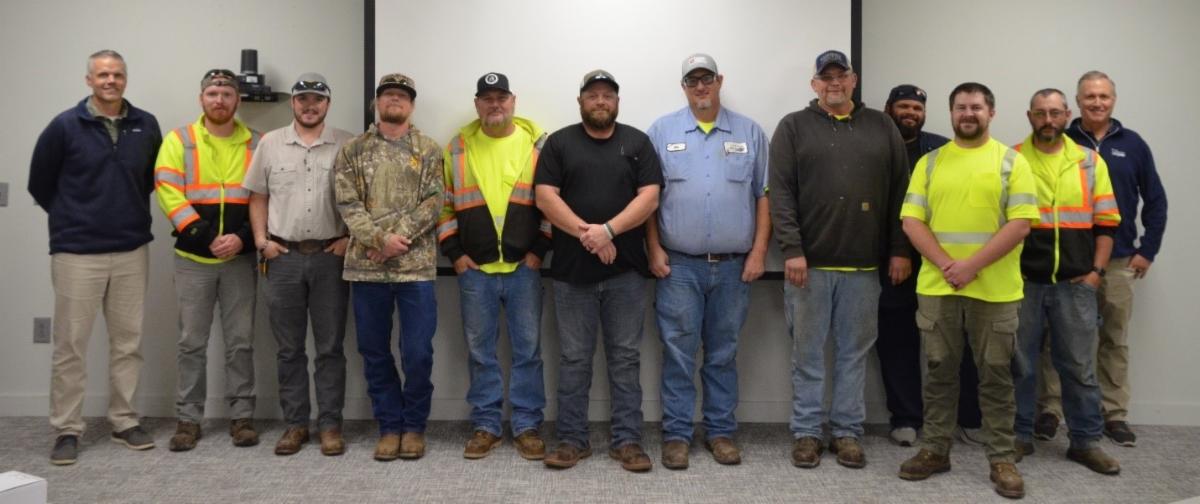 Graduates of the latest Kansas City District's Maintenance Leadership Academy pose with district leadership.