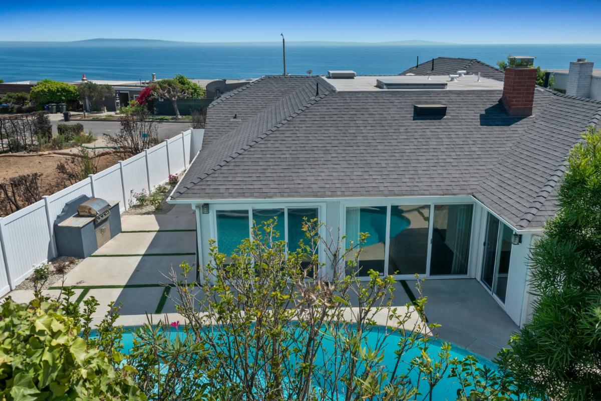 Luxury Malibu lease home featuring poolside ocean views from 18133 Wakecrest Drive in Sunset Mesa.