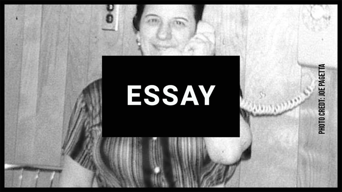 ESSAY with person on phone PHOTO CREDIT: JOE PAGETTA