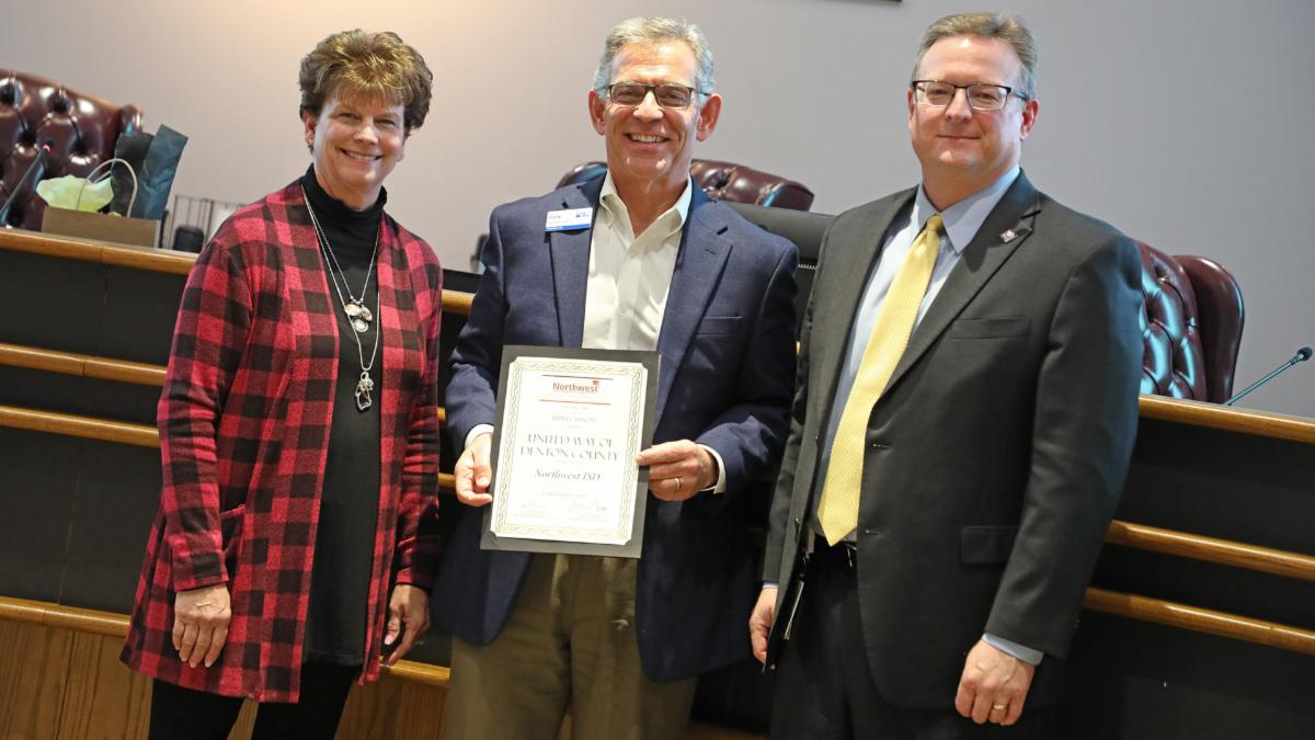 Trustees recognize Gary Henderson of United Way.