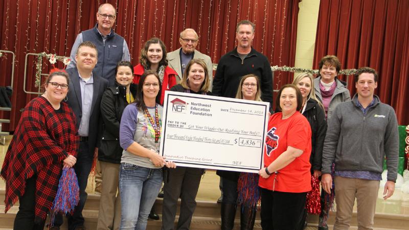 Teachers from Hatfield hold their grant check