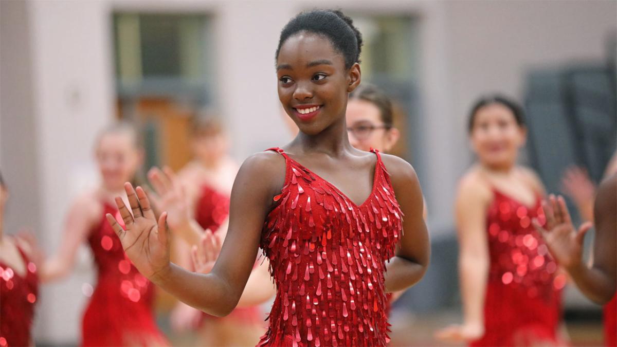 A member of the Middle School Dance Team performs earlier this year.