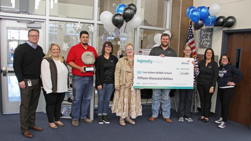 Adams Middle School accepts its $15,000 Devon Energy grant