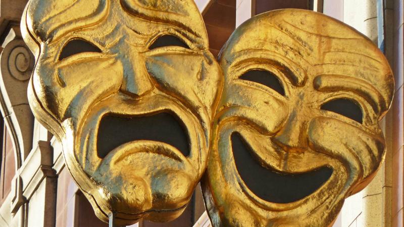 A photo of theatre drama and comedy masks