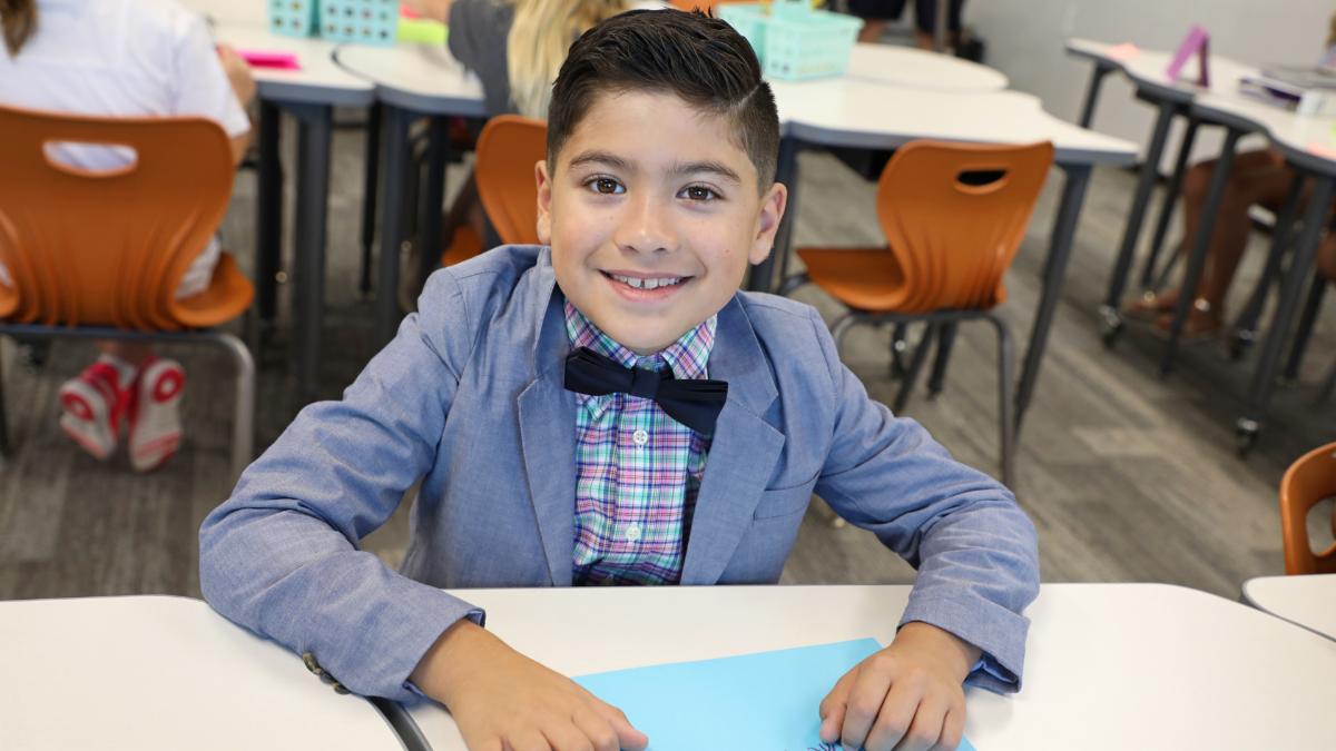 A student at Lance Thompson smiles on the first day of the 2019-20 school year.