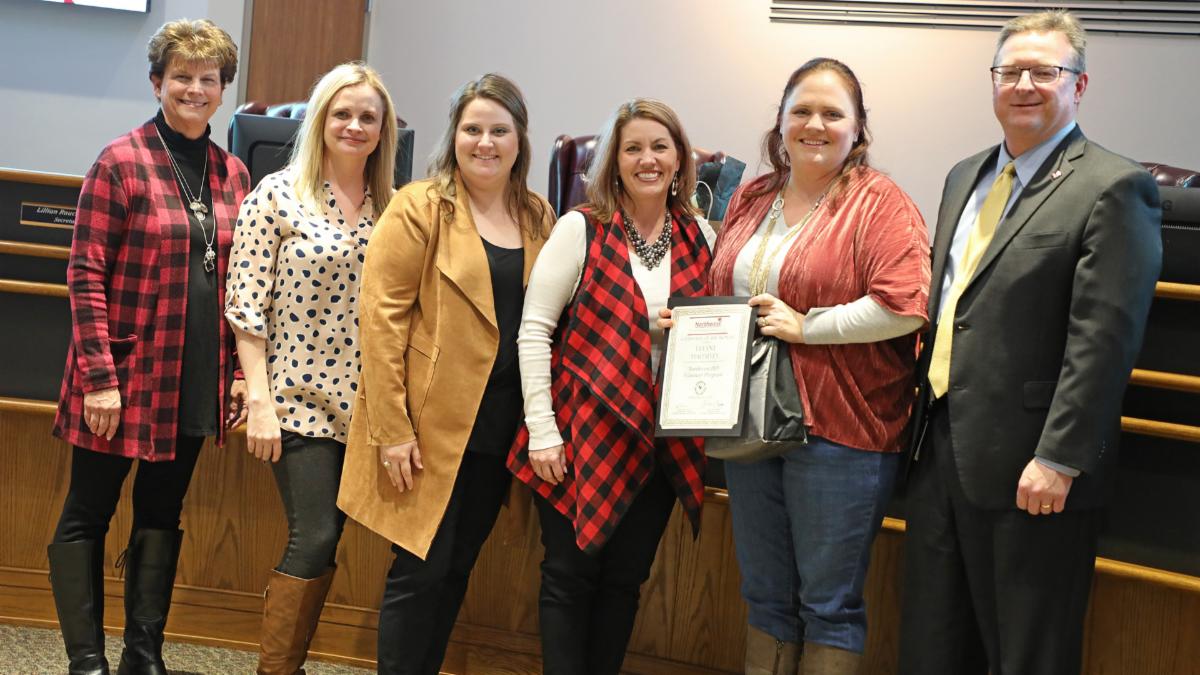 Trustees recognized the volunteer of the month Tiffany Mahaffey