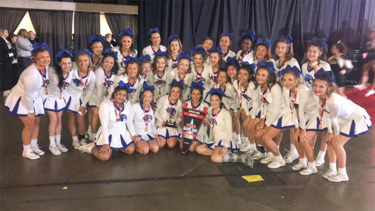 Byron Nelson cheerleaders pose for a photo at NCA High School Nationals