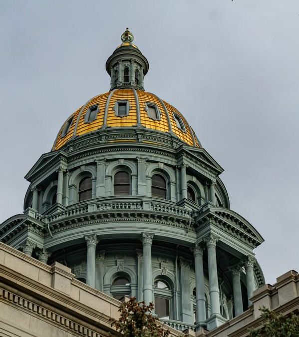 Outside, looking up at the dome of the Colorado Capitol Building 