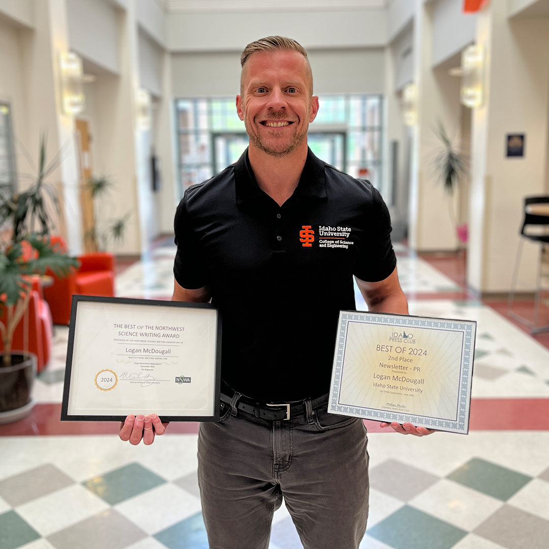 Logan McDougall poses for a photo